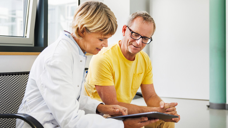 Man having a conversation with his doctor