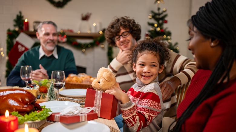 Smiling family celebrating Christmas