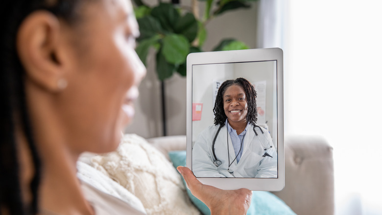 Woman having a telemedicine appointment with her doctor