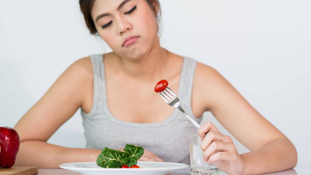 Woman eating a salad