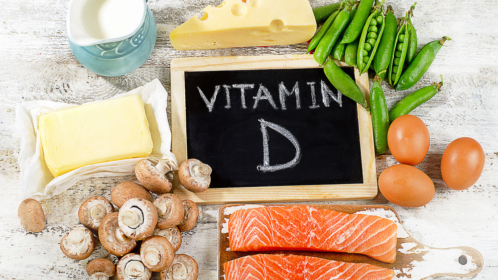 Variety of foods with the words Vitamin D written on chalkboard