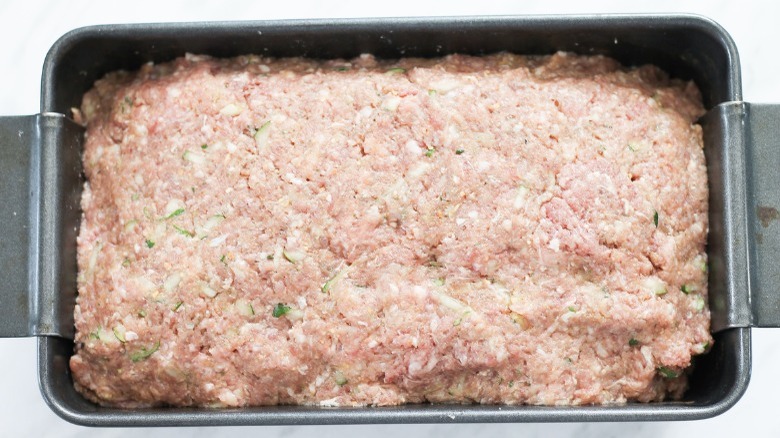 uncooked meatloaf in loaf pan